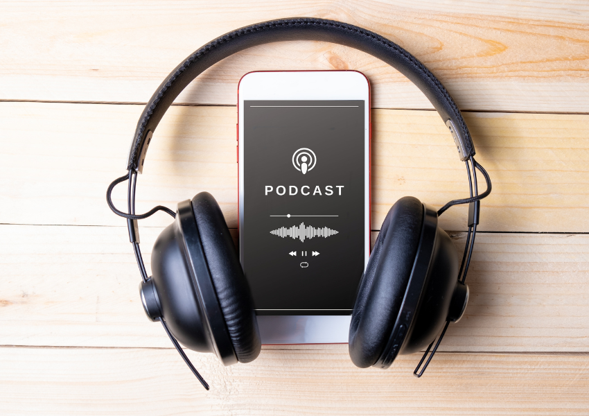 image of headphones and podcast player