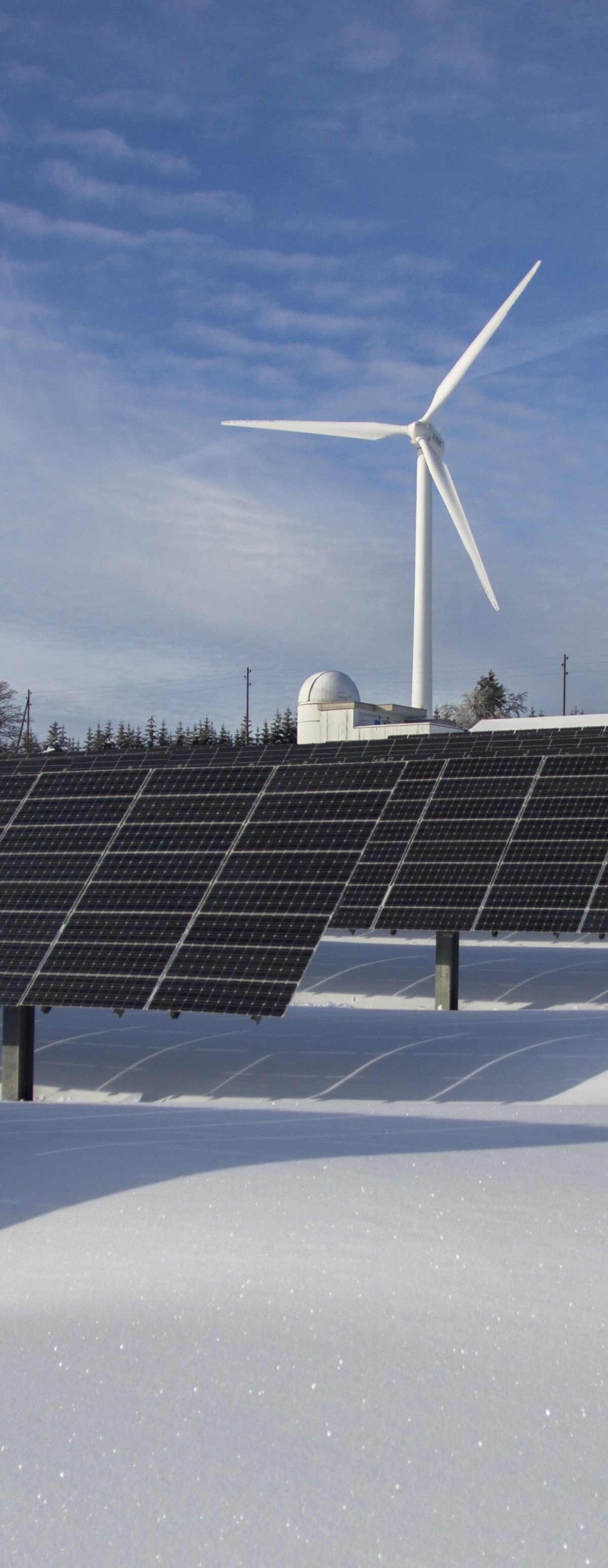 Image of solar panels and windmill