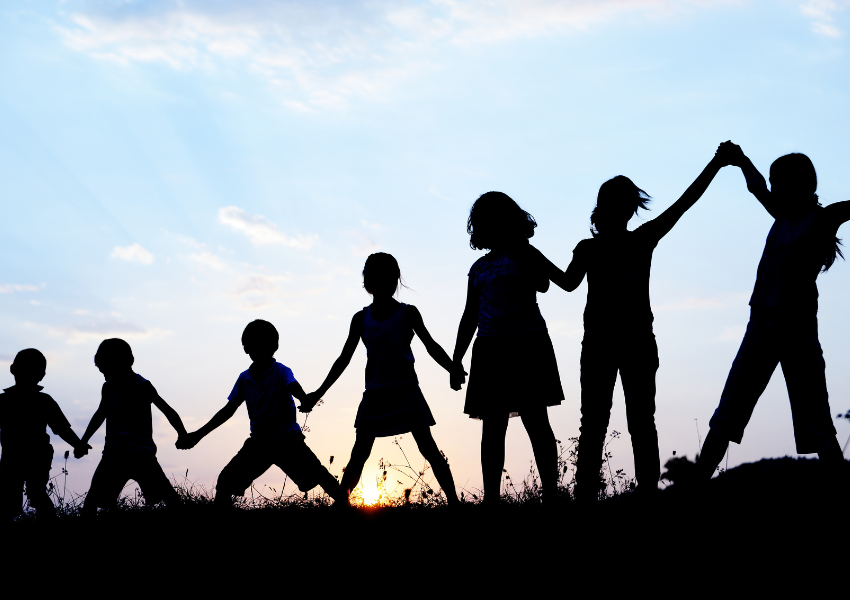 Silhouette of children of different ages and heights